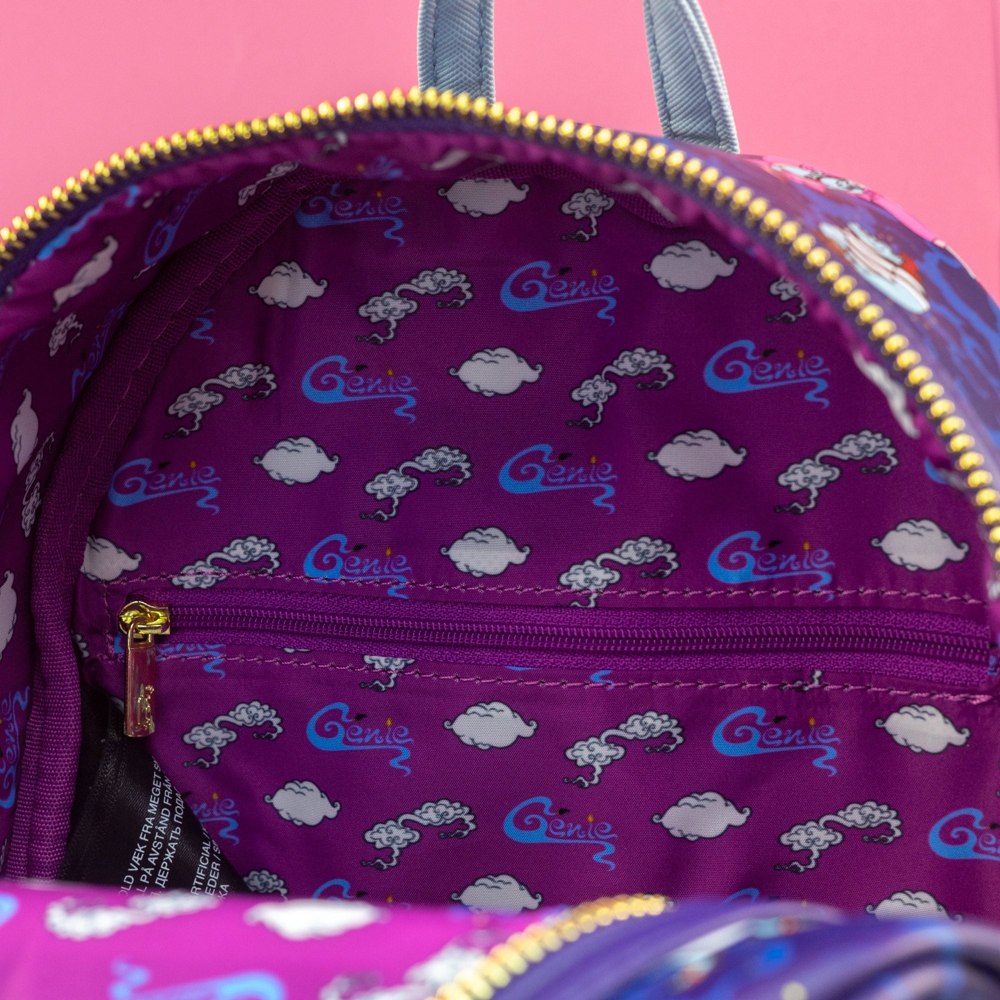 Loungefly x Disney Aladdin The Genie Transformations AOP Mini Backpack - GeekCore