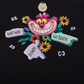 Loungefly x Disney Alice in Wonderland Cheshire Cat Floral Crossbody Bag - GeekCore
