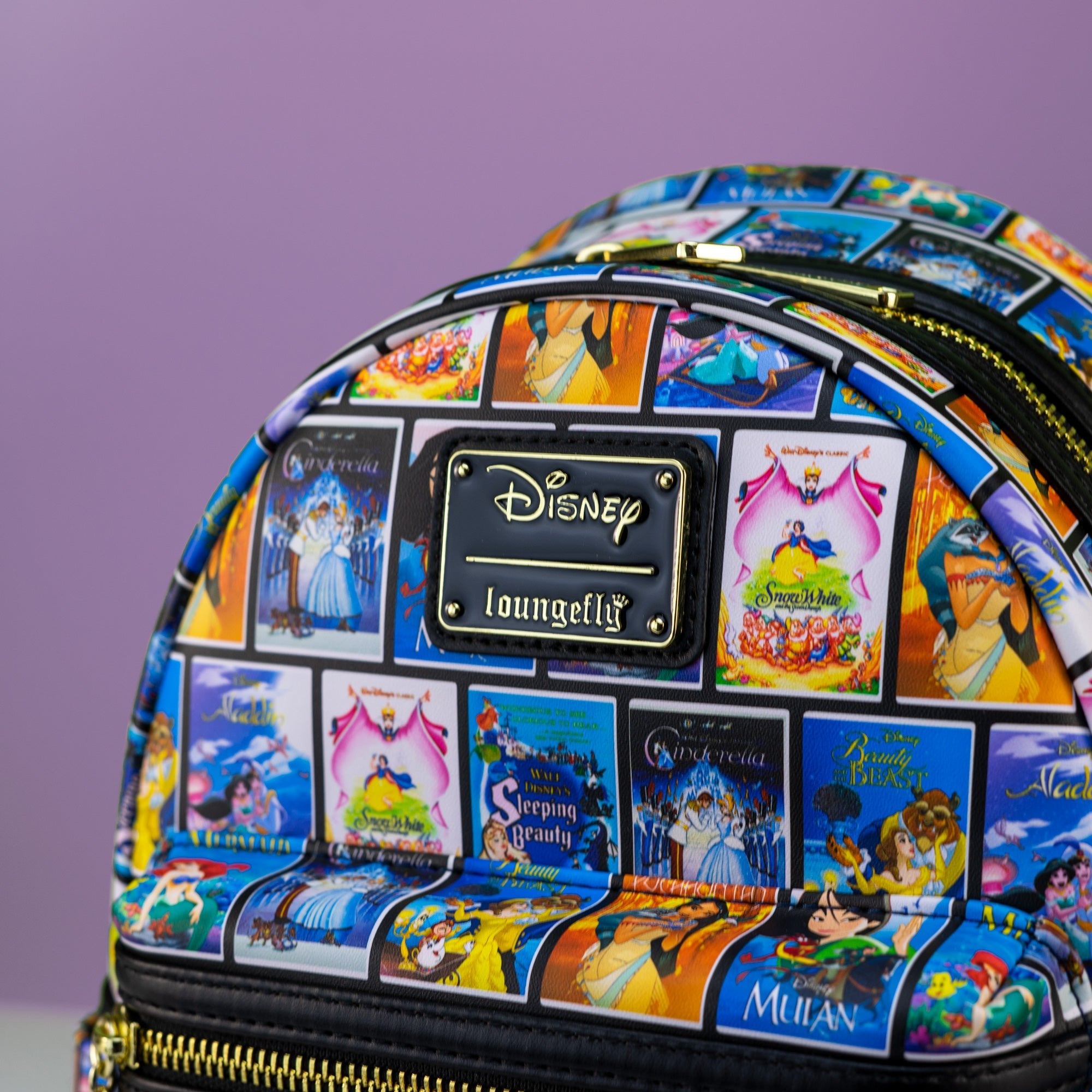 Loungefly x Disney Classic VHS Tape Film Covers Mini Backpack - GeekCore