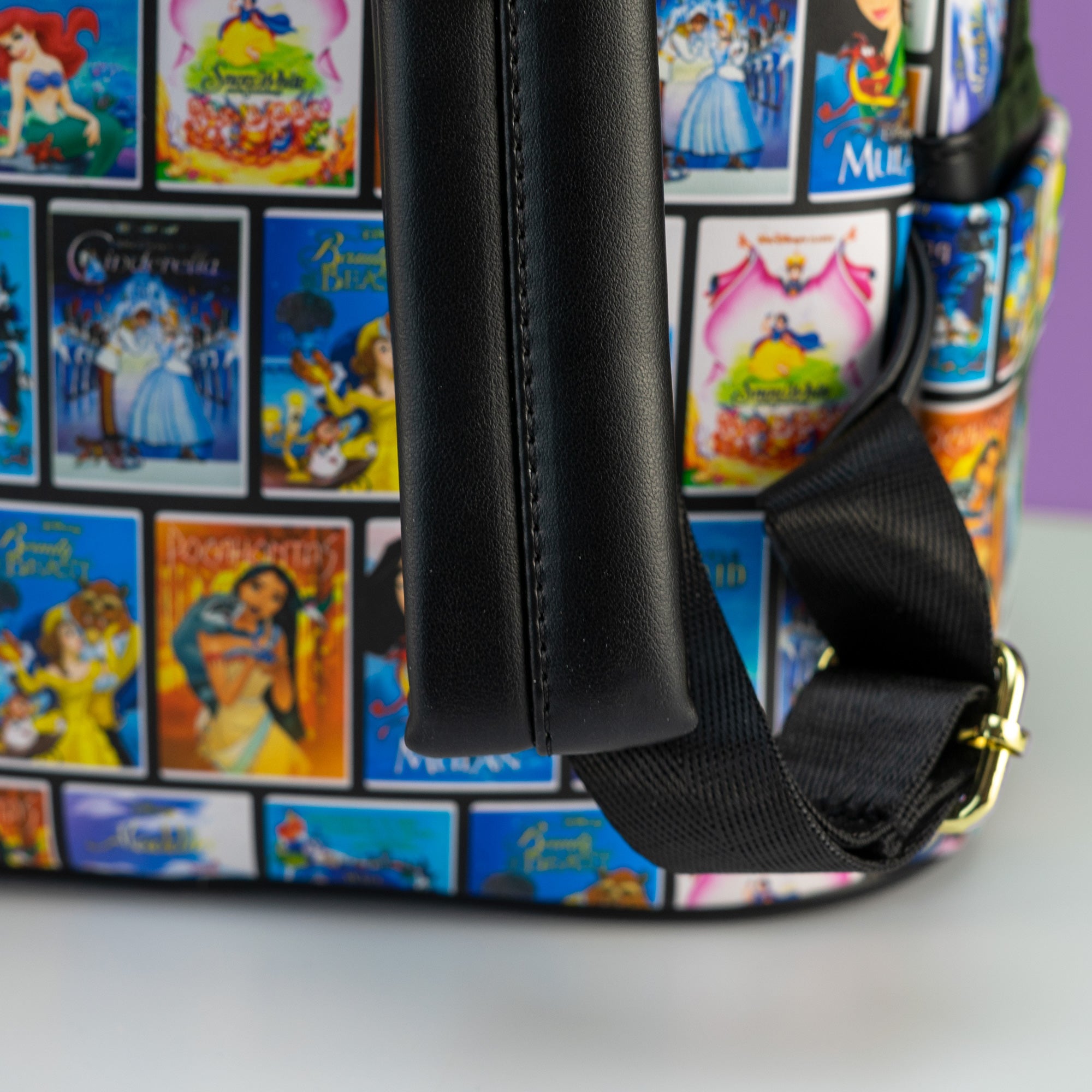 Loungefly x Disney Classic VHS Tape Film Covers Mini Backpack - GeekCore