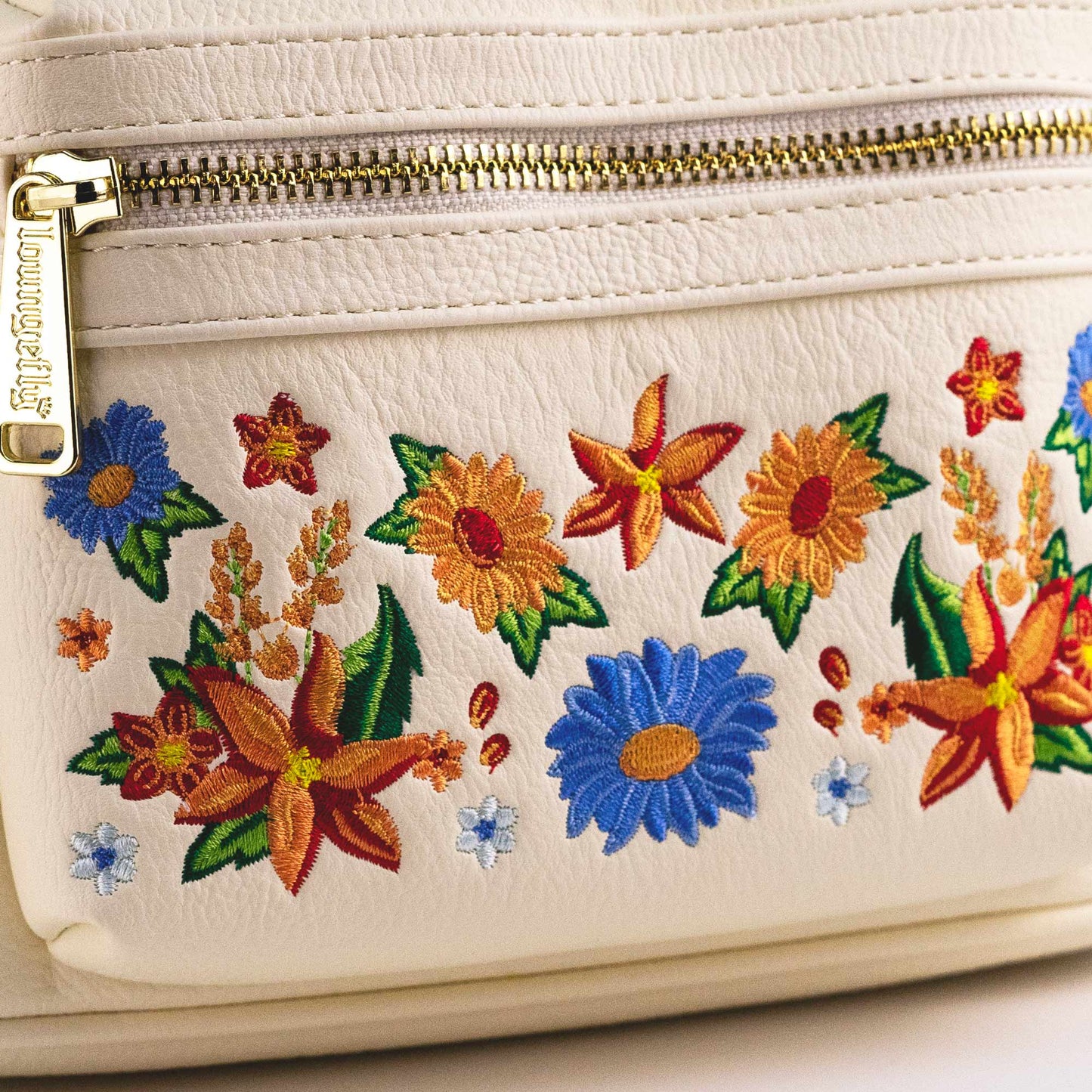 Loungefly x Disney Minnie Mouse Floral Tassel Mini Backpack - GeekCore