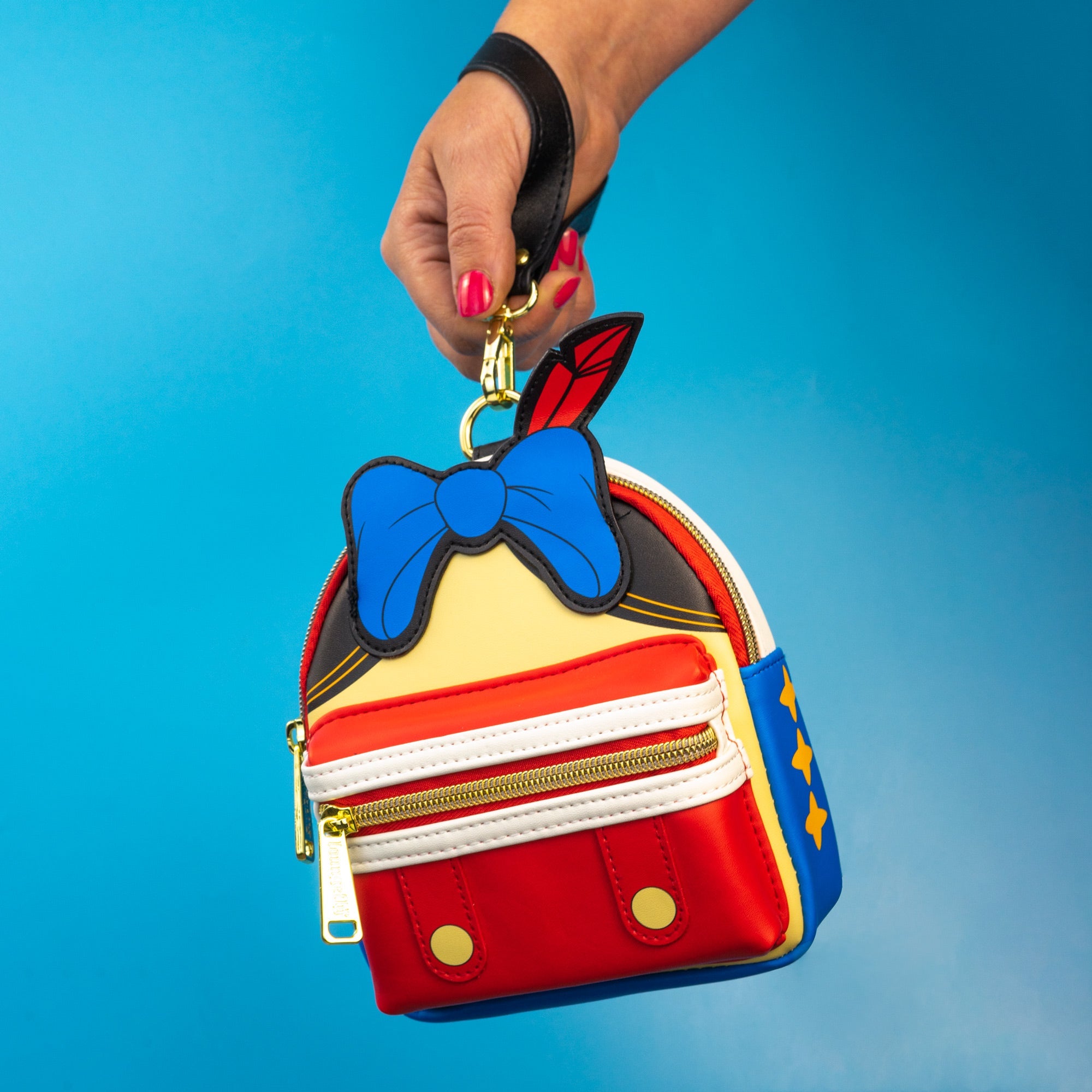 Loungefly x Disney Pinocchio Cosplay Wristlet - GeekCore