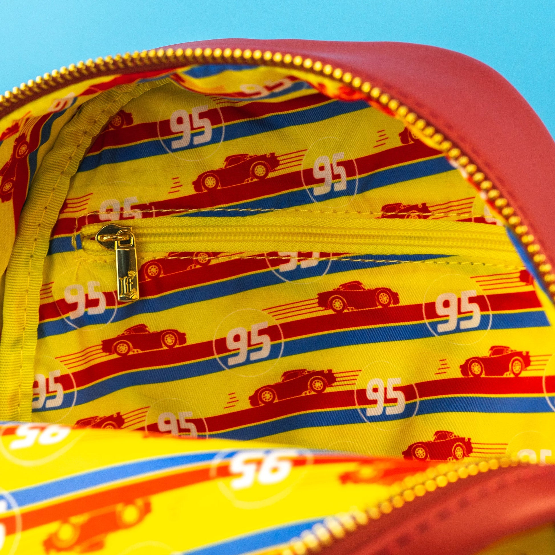 Loungefly x Disney Pixar Cars Lightining McQueen Radiator Springs Mini Backpack - GeekCore