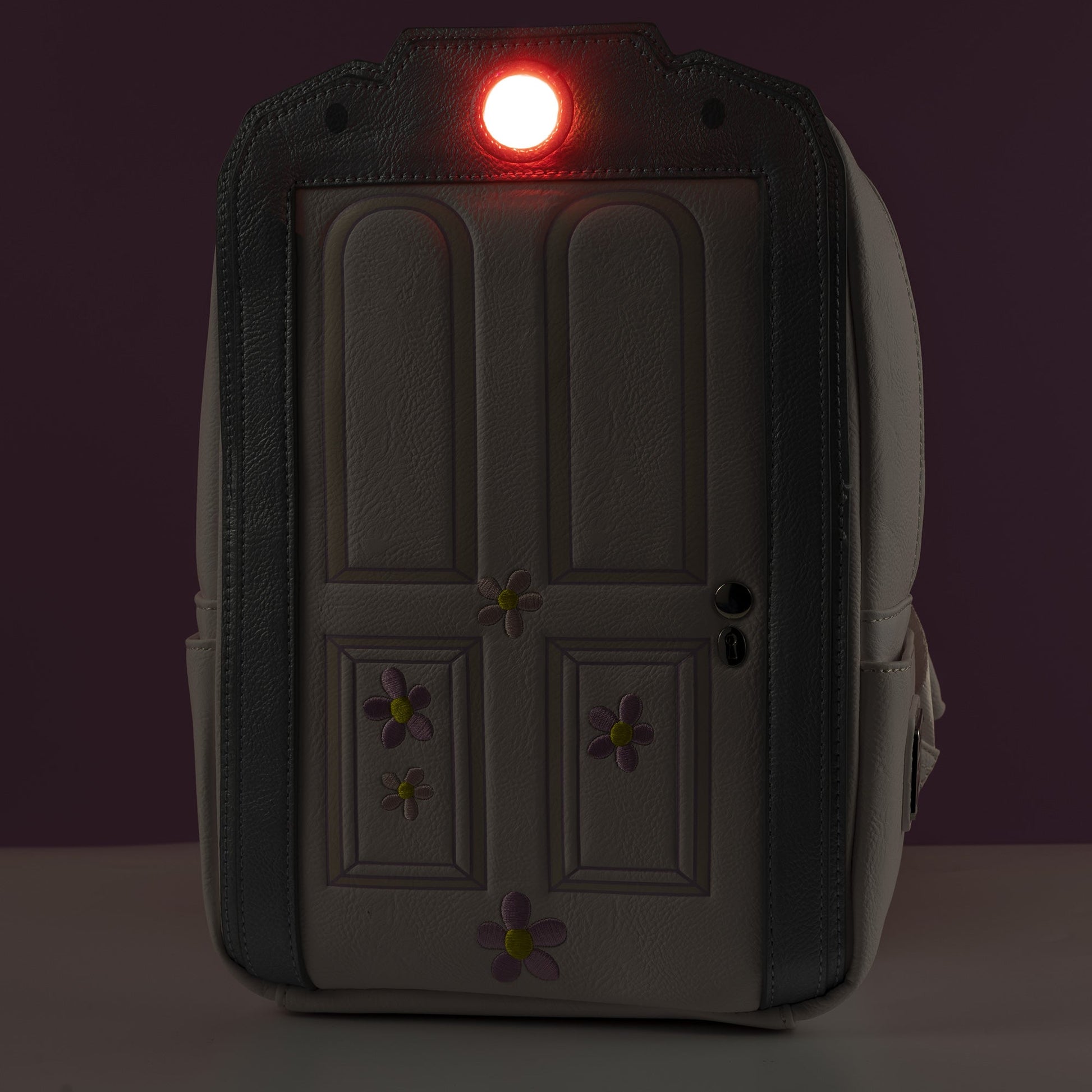 Loungefly x Disney Pixar Monsters Inc Light Up Boo's Door Mini Backpack - GeekCore