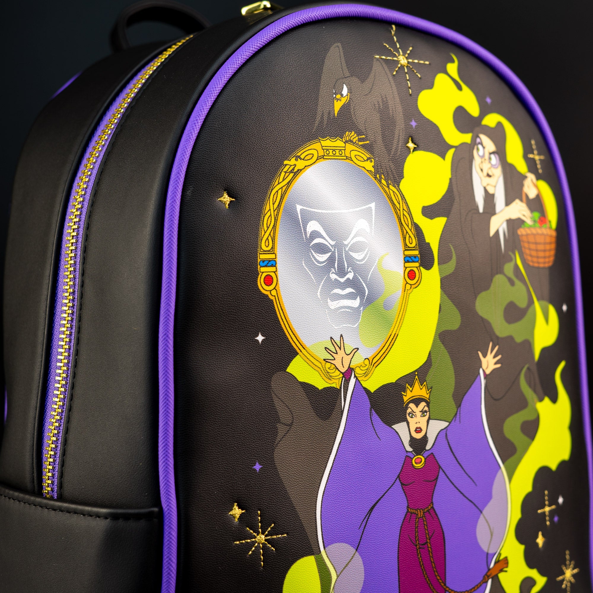 evil queen villains scenes mini backpack Disney Add some sinister style to your wardrobe with this mini backpack by Loungefly featuring Disney villains including Ursula Evil Queen Loungefly Mirror Disney