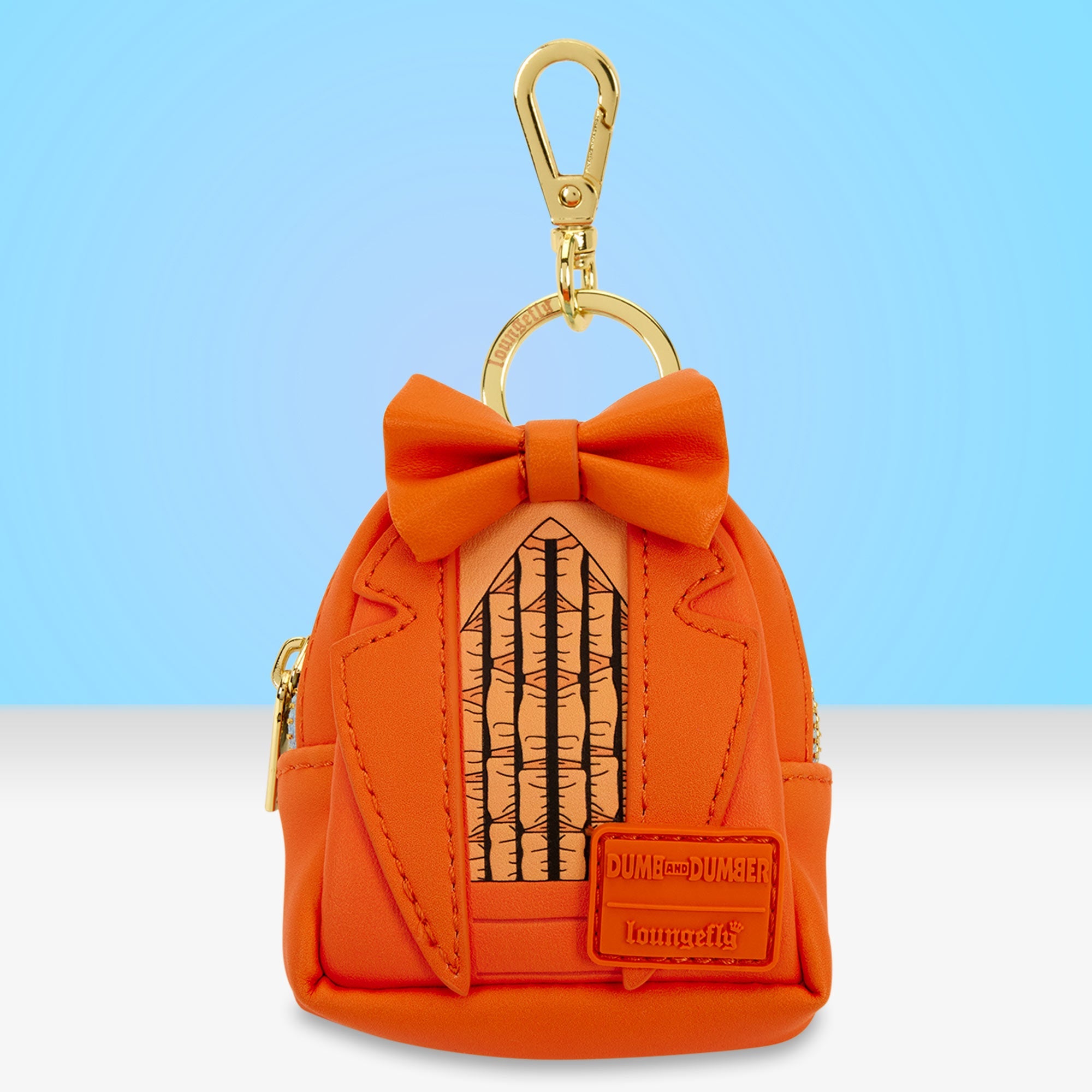 Loungefly x Dumb & Dumber Suit Bag Charm - GeekCore