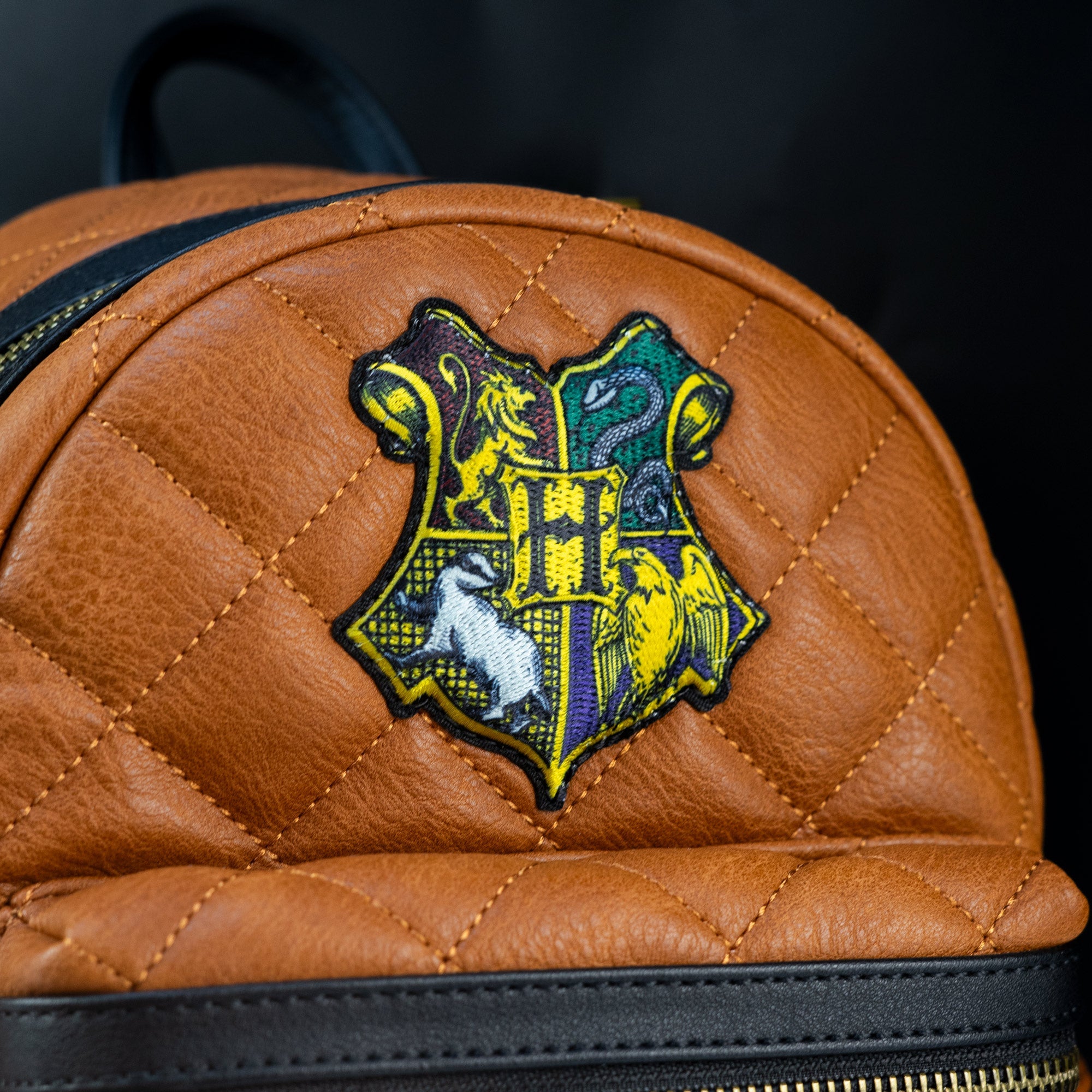 harry potter hogwarts crest mini backpack Gryffindor Shop Universal Its the Harry Potter Hogwarts Crest Loungefly Mini Backpack Varsity Jacket Harry Potter Hogwarts