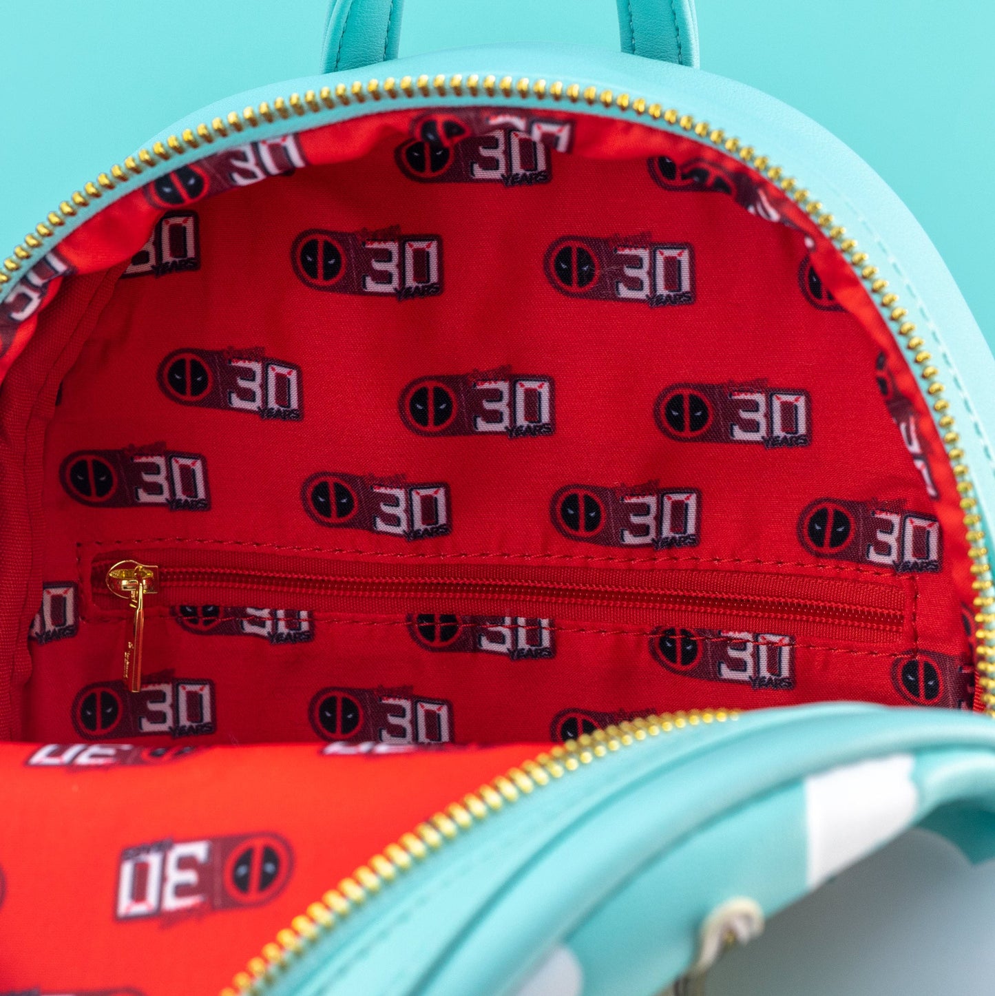 Loungefly x Marvel Deadpool 30th Anniversary Unicorn Rainbow Mini Backpack - GeekCore