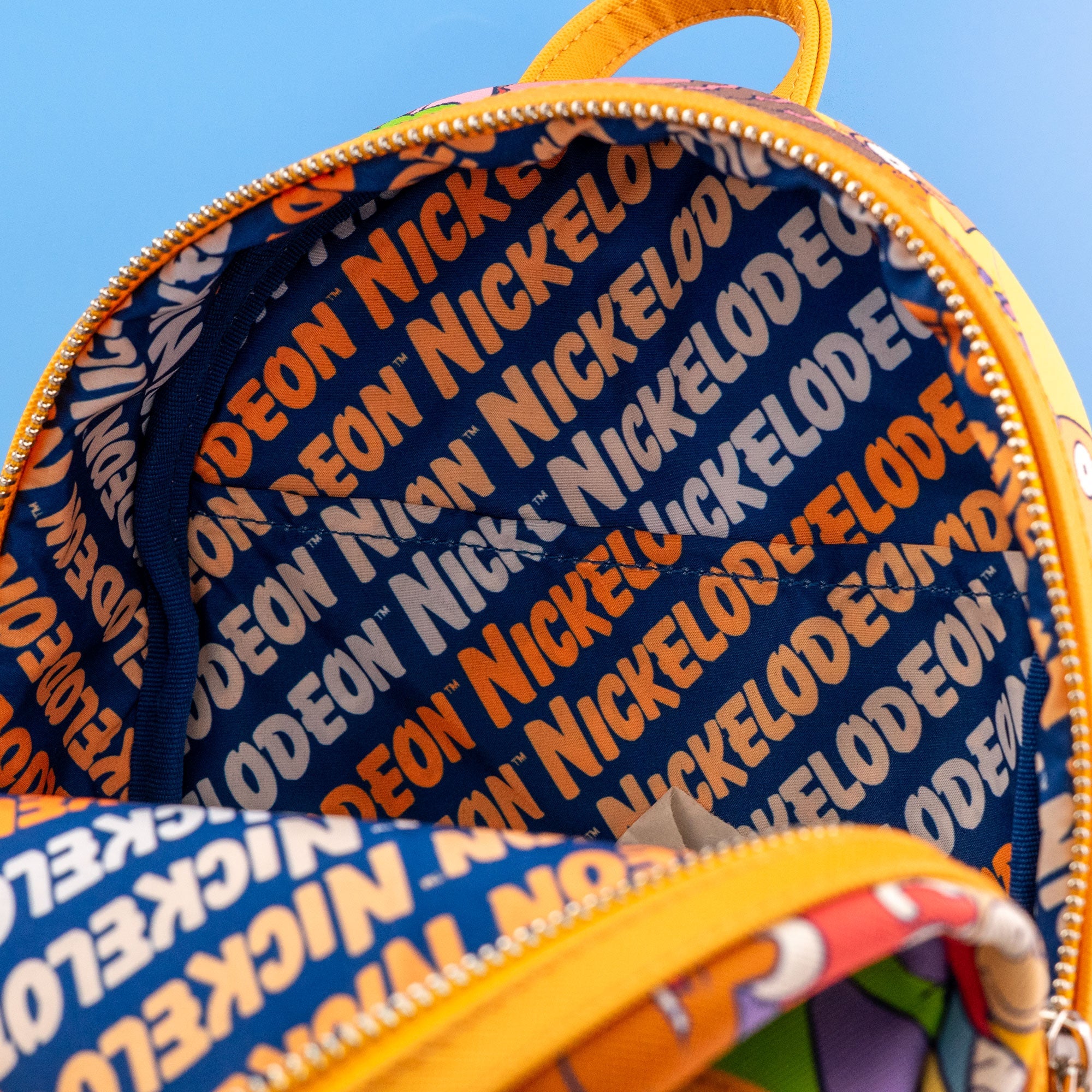 Loungefly x Nickelodeon Nick 90s Colour Block AOP Mini Backpack - GeekCore